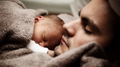 A Sleeping Man and a baby (Courtesy: Pixabay)